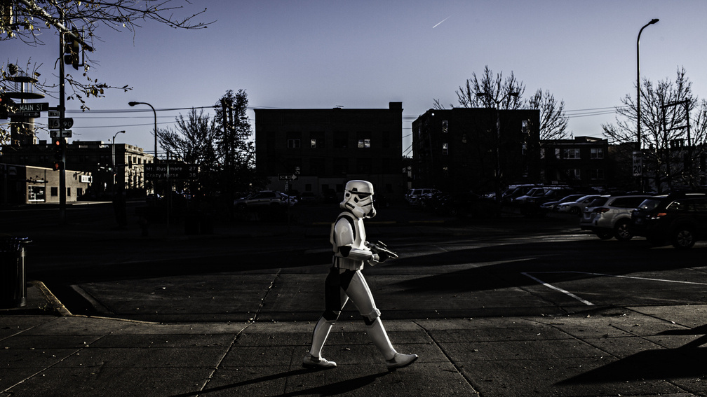 A masked man crosses the street - Rapid City SD 2013